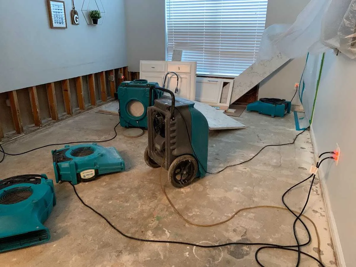Dehumidifier in flood-cut room for Water Damage Restoration in Westtown